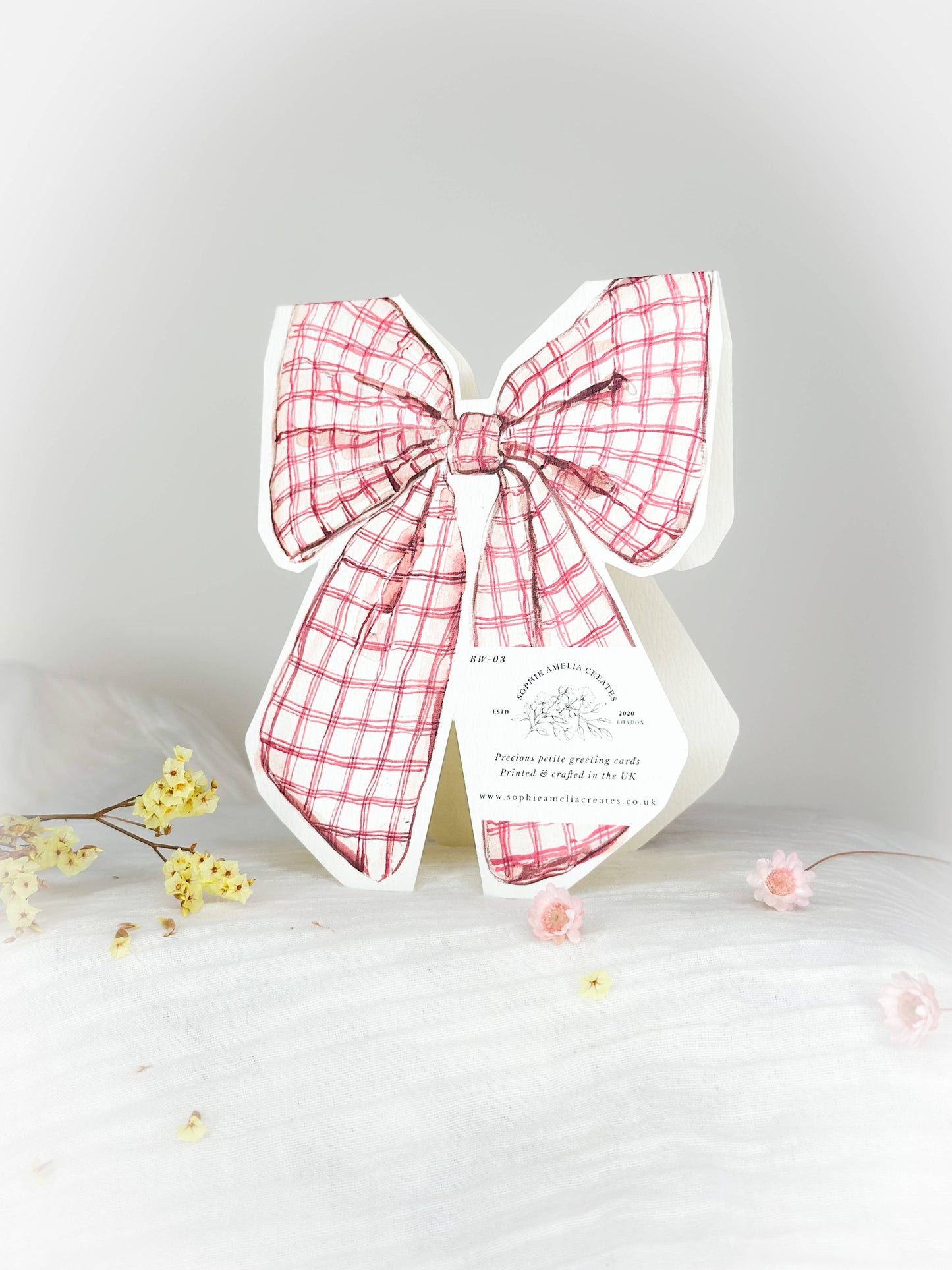 Merry bow shaped Christmas card