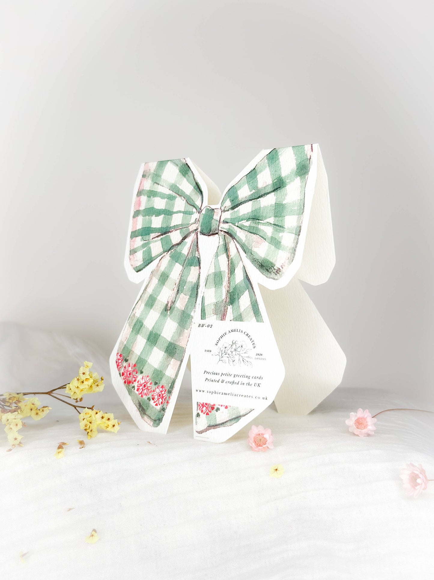 Season's Greetings bow shaped Christmas card